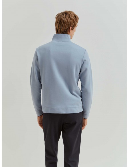 SUETER CON CUELLO Y ZIP CELESTE