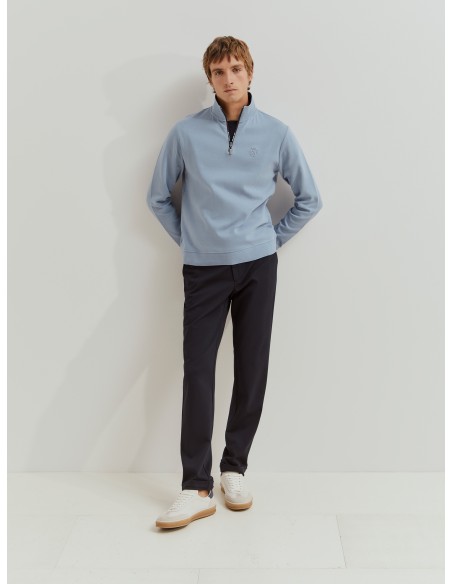 SUETER CON CUELLO Y ZIP CELESTE